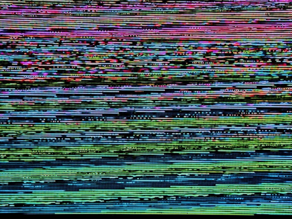Colourful digital glitch pattern representing modern brain training and cognitive enhancement.