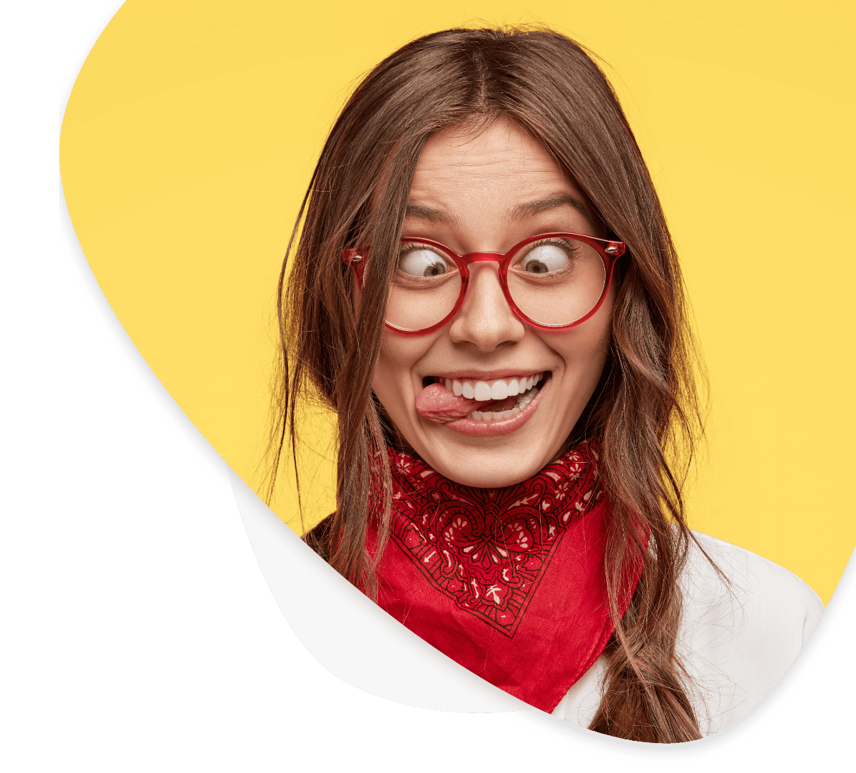 Smiling young woman with red glasses and red bandana making a silly face against a yellow background, representing fun learning and cognitive development with mindboost.
