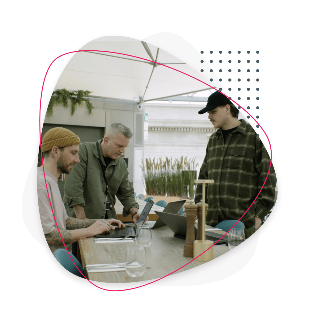 Innovative educational workshop in a bright, modern environment with diverse participants engaging in collaborative learning activities. Focus on creativity, teamwork, and skill development.